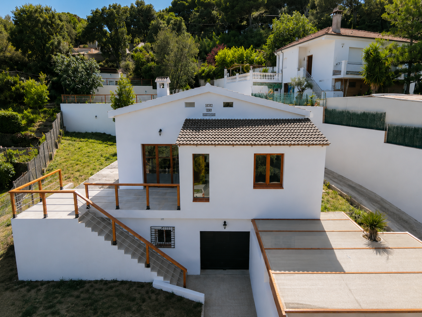 Casa unifamiliar reformada con piscina, jardín y vistas despejadas a la montaña y al Mediterráneo en la urbanización Can Domènech, Tordera.